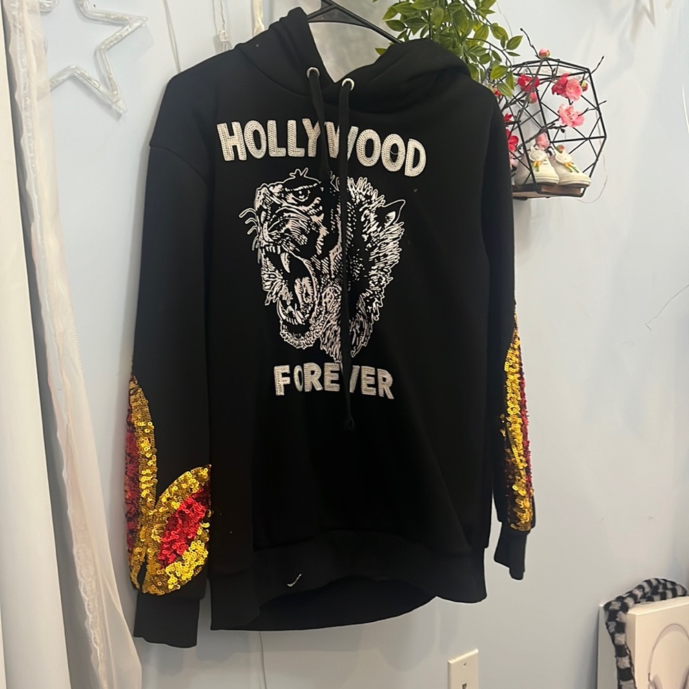 Black designed with fire on the sleeves hoodie